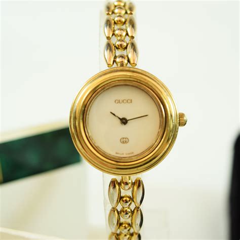 gucci gold thin band watch with interchangeable circular faces|Gucci detachable shoulder strap replacement.